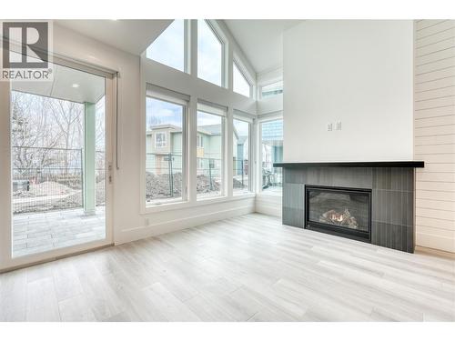 3160 Landry Crescent, Summerland, BC - Indoor Photo Showing Living Room With Fireplace