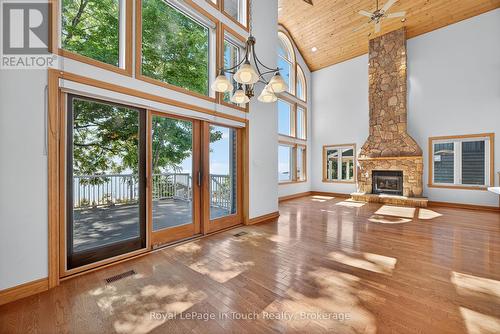 44 Tiny Beaches Road S, Tiny, ON - Indoor Photo Showing Other Room With Fireplace