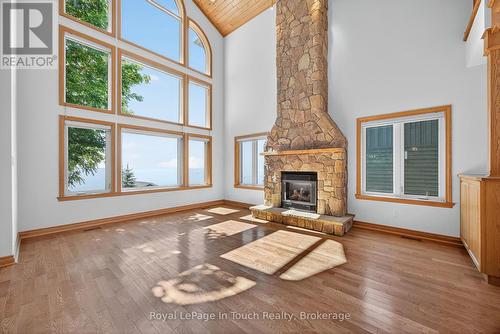 44 Tiny Beaches Road S, Tiny, ON - Indoor Photo Showing Living Room With Fireplace