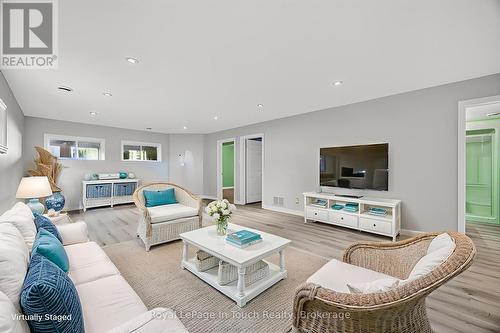 Virtually Staged - 44 Tiny Beaches Road S, Tiny, ON - Indoor Photo Showing Living Room