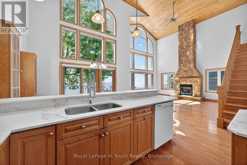 44 Tiny Beaches Road S, Tiny, ON - Indoor Photo Showing Kitchen With Fireplace With Double Sink
