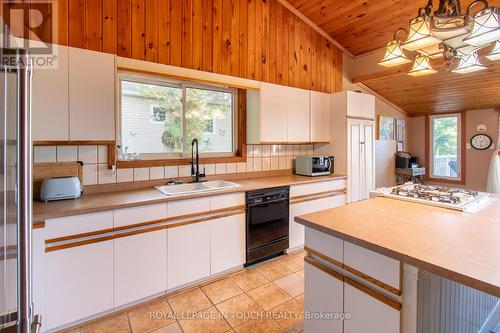 64 Wahnekewening Drive, Tiny, ON - Indoor Photo Showing Kitchen With Double Sink