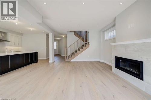 83 Crosswinds Drive, Kitchener, ON - Indoor Photo Showing Living Room With Fireplace