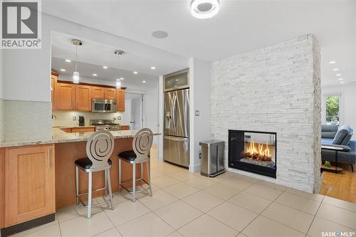 34 Leslie Place, Regina, SK - Indoor Photo Showing Kitchen With Fireplace