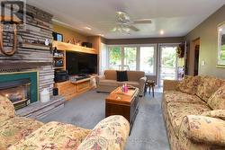 Living Room featuring built-in cabinetry - 