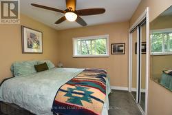 Bedroom featuring mirrored closed - 