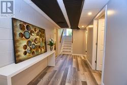 Lower Level Foyer featuring new vinyl flooring - 