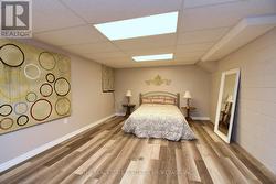 Lower Level Bedroom featuring new vinyl flooring - 