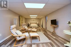 Lower Level Bedroom featuring large setting area - 