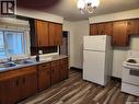 19 10Th Avenue Ne, Swift Current, SK  - Indoor Photo Showing Kitchen With Double Sink 