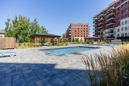 Pool - 109-9175 Rue Lennon, Brossard, QC - Outdoor With In Ground Pool