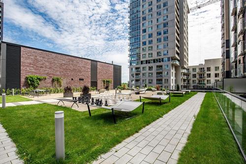 Backyard - 1201-235 Rue Peel, Montréal (Le Sud-Ouest), QC - Outdoor With Facade