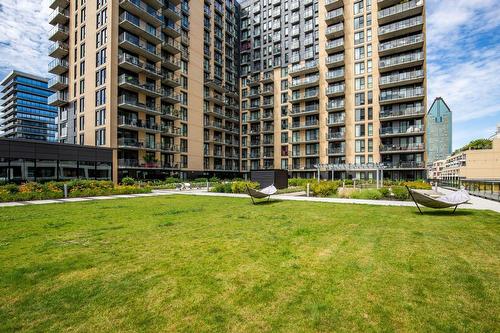 Backyard - 1201-235 Rue Peel, Montréal (Le Sud-Ouest), QC - Outdoor With Balcony With Facade
