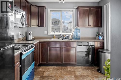 35 5004 James Hill Road, Regina, SK - Indoor Photo Showing Kitchen With Double Sink