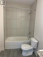 Bathroom with  shower combination, wood finished floors, and vanity - 