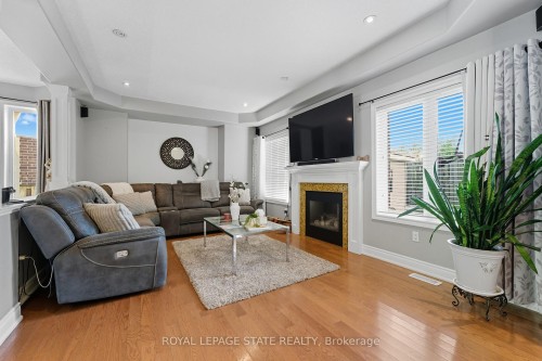 23 Kellogg Avenue, Hamilton, ON - Indoor Photo Showing Living Room With Fireplace