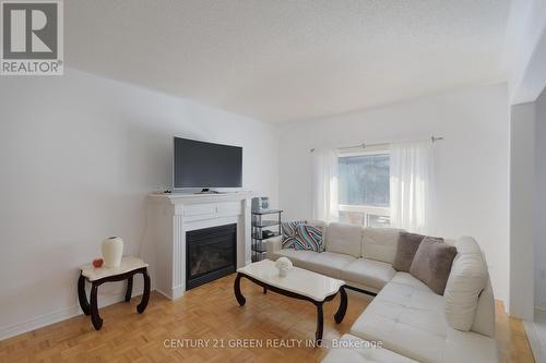 8 Lampman Drive, Toronto, ON - Indoor Photo Showing Living Room With Fireplace