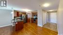 108 3730 Eastgate Drive E, Regina, SK  - Indoor Photo Showing Kitchen With Stainless Steel Kitchen With Double Sink 