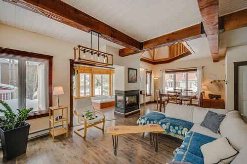 Salon - 920 Rue Du Boisé, Sainte-Adèle, QC - Indoor Photo Showing Living Room With Fireplace
