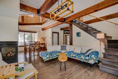 Salon - 920 Rue Du Boisé, Sainte-Adèle, QC - Indoor Photo Showing Living Room With Fireplace