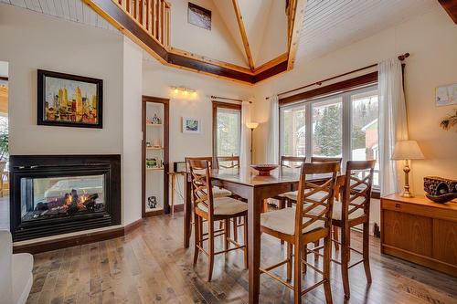 Salle à manger - 920 Rue Du Boisé, Sainte-Adèle, QC - Indoor Photo Showing Dining Room With Fireplace