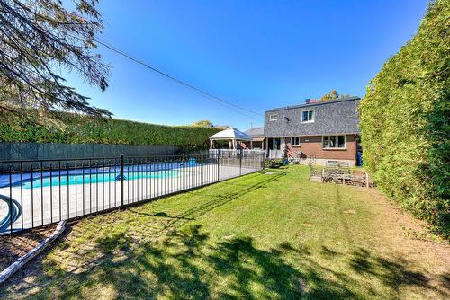 Backyard - 20 Rue Réginald-Brown, Kirkland, QC - Outdoor With Backyard