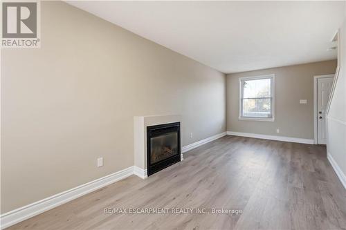 187 Barton Street W, Hamilton, ON - Indoor Photo Showing Other Room With Fireplace