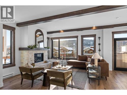 7000 Mcgillivray Lake Drive Unit# 13, Sun Peaks, BC - Indoor Photo Showing Living Room With Fireplace