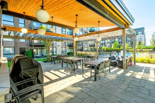 Piscine - 306-3675 Rue Roland-Marquette, Longueuil (Saint-Hubert), QC - Outdoor With Deck Patio Veranda