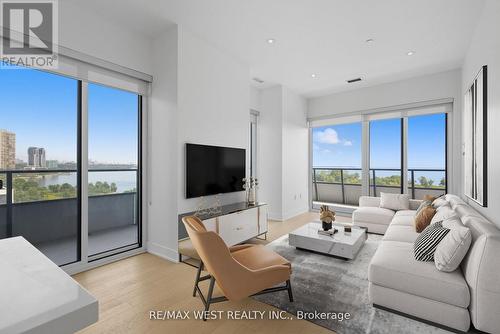 702 - 20 Shore Breeze Drive, Toronto, ON - Indoor Photo Showing Living Room