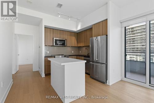 702 - 20 Shore Breeze Drive, Toronto, ON - Indoor Photo Showing Kitchen