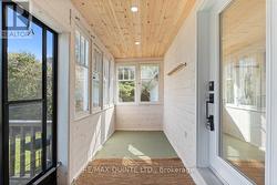 Enclosed porch surrounded by windows - 