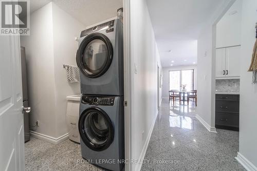 107 - 8111 Forest Glen Drive, Niagara Falls (Mt. Carmel), ON - Indoor Photo Showing Laundry Room