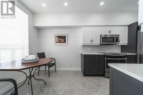 107 - 8111 Forest Glen Drive, Niagara Falls (Mt. Carmel), ON - Indoor Photo Showing Kitchen