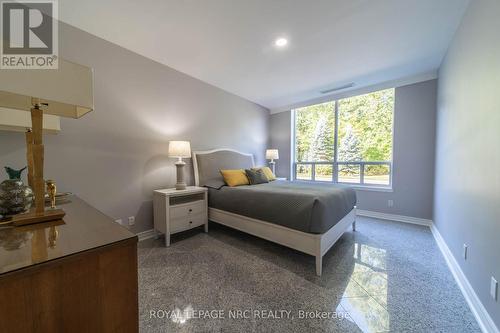 107 - 8111 Forest Glen Drive, Niagara Falls (Mt. Carmel), ON - Indoor Photo Showing Bedroom