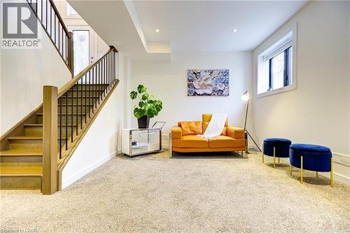 Living area featuring carpet flooring, stairway, and recessed lighting - 847 Stedwell Street, London, ON - Indoor Photo Showing Other Room