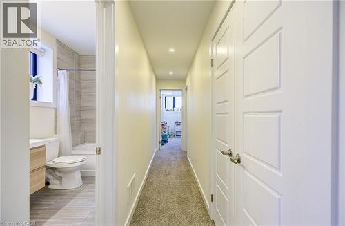 Hallway featuring recessed lighting and light carpet - 847 Stedwell Street, London, ON - Indoor Photo Showing Bathroom