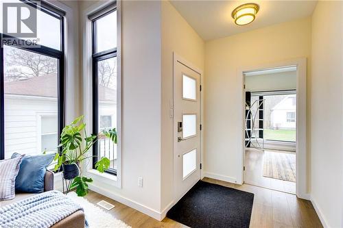 Foyer entrance featuring baseboards and light wood finished floors - 847 Stedwell Street, London, ON - Indoor Photo Showing Other Room