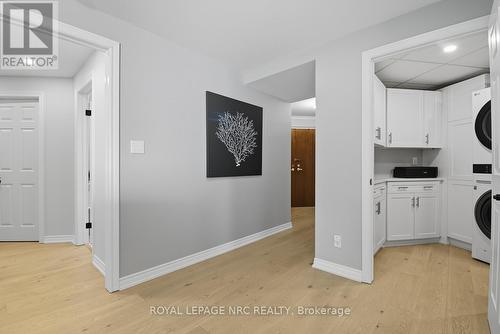 Insuite laundry with storage and wash tub - 2206 - 701 Geneva Street, St. Catharines (Lakeshore), ON - Indoor Photo Showing Other Room