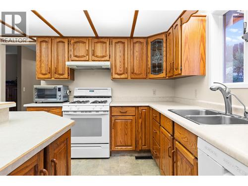 230 Cypress Drive, Coldstream, BC - Indoor Photo Showing Kitchen With Double Sink