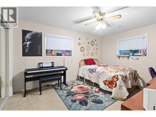 230 Cypress Drive, Coldstream, BC - Indoor Photo Showing Bedroom