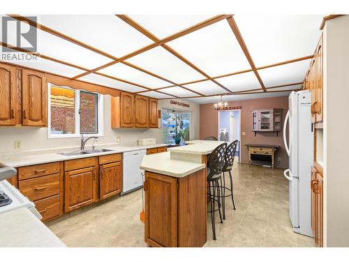 230 Cypress Drive, Coldstream, BC - Indoor Photo Showing Kitchen With Double Sink