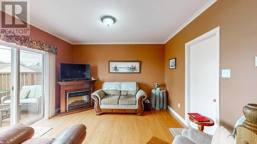 32 Mccourt Close, Conception Bay South, NL - Indoor Photo Showing Living Room With Fireplace