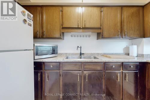5-213 - 50 Old Kingston Road, Toronto, ON - Indoor Photo Showing Kitchen With Double Sink
