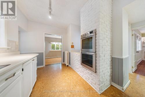 1173 Queen Victoria Avenue, Mississauga, ON - Indoor Photo Showing Kitchen With Fireplace