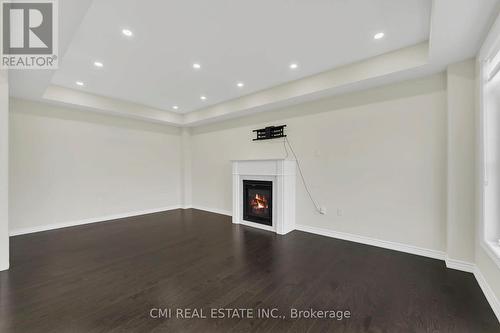 22 Wainwright Drive, Brampton, ON - Indoor Photo Showing Other Room With Fireplace