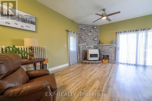 940 Hutchinson Road, Haldimand, ON - Indoor Photo Showing Living Room With Fireplace