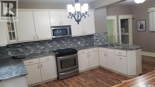 1422 Cameron Street, Regina, SK - Indoor Photo Showing Kitchen With Double Sink