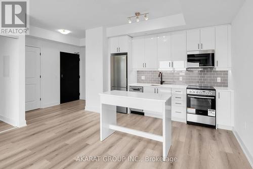 731 - 2343 Khalsa Gate, Oakville, ON - Indoor Photo Showing Kitchen With Stainless Steel Kitchen With Upgraded Kitchen
