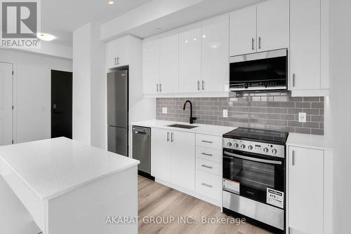 731 - 2343 Khalsa Gate, Oakville, ON - Indoor Photo Showing Kitchen With Stainless Steel Kitchen With Upgraded Kitchen